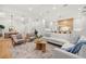 Open concept living room with hardwood floors and modern decor at 3011 W Asbury Pl, Tampa, FL 33611