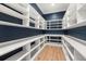 Walk-in pantry with white shelves and blue walls at 3011 W Asbury Pl, Tampa, FL 33611