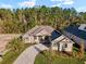 Single-Gathering home with a large backyard and tree coverage at 5034 Elm Leaf Dr, Brooksville, FL 34601