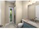 Small bathroom with shower, toilet and exterior access at 5034 Elm Leaf Dr, Brooksville, FL 34601