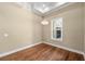 Formal dining room with hardwood floors and natural light at 5034 Elm Leaf Dr, Brooksville, FL 34601