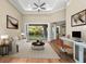 Bright living room with hardwood floors and access to a patio at 5034 Elm Leaf Dr, Brooksville, FL 34601