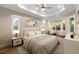 Main bedroom with hardwood floors and sitting area at 5034 Elm Leaf Dr, Brooksville, FL 34601