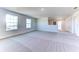 Spacious bonus room with neutral carpeting and large windows at 16134 69Th Lane East, Parrish, FL 34219