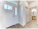 Inviting entryway with white door and adjacent half-bath at 16134 69Th Lane East, Parrish, FL 34219