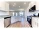 Modern kitchen with stainless steel appliances and granite countertops at 16134 69Th Lane East, Parrish, FL 34219