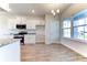 Modern kitchen with white cabinets and granite counters at 16134 69Th Lane East, Parrish, FL 34219