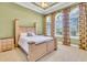 Spacious bedroom with light walls and large windows at 19451 Ganton Ave, Bradenton, FL 34202