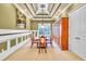 Formal dining room with a large table and built-in hutch at 19451 Ganton Ave, Bradenton, FL 34202