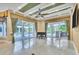 Bright Gathering room with pool view, opens to outdoor entertaining space at 19451 Ganton Ave, Bradenton, FL 34202