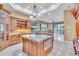 Gourmet kitchen with large island and stainless steel appliances at 19451 Ganton Ave, Bradenton, FL 34202