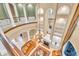 High-ceilinged living room with balcony overlooking the main level at 19451 Ganton Ave, Bradenton, FL 34202