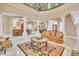 Spacious living room with a large area rug and comfortable seating at 19451 Ganton Ave, Bradenton, FL 34202