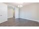 Bright home office with hardwood floors and white doors at 707 W Fribley St, Tampa, FL 33603