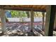 Unfinished basement with view of backyard through framed opening at 3416 W Barcelona St, Tampa, FL 33629
