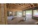 Under construction interior showing framing, windows and concrete floor at 3416 W Barcelona St, Tampa, FL 33629