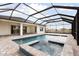 Relaxing pool and spa with covered patio and open views at 11618 Gleaming Ter, Venice, FL 34293