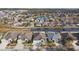 Neighborhood view with lake and various houses at 6843 Boulder Run Loop, Wesley Chapel, FL 33545