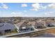 Backyard with screened enclosure and canal view at 6843 Boulder Run Loop, Wesley Chapel, FL 33545