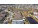 Aerial view of a residential community with houses and lakes at 6843 Boulder Run Loop, Wesley Chapel, FL 33545