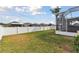 Large backyard with grassy area and privacy fence at 6843 Boulder Run Loop, Wesley Chapel, FL 33545
