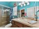 Bathroom with a teal color scheme at 6843 Boulder Run Loop, Wesley Chapel, FL 33545