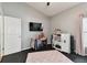 Playful bedroom with a crib and toys at 6843 Boulder Run Loop, Wesley Chapel, FL 33545