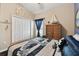 Nautical themed bedroom with full bed and blue walls at 6843 Boulder Run Loop, Wesley Chapel, FL 33545