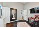 Spacious bedroom with large mirror and TV at 6843 Boulder Run Loop, Wesley Chapel, FL 33545