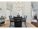 Casual dining area with round table and chairs, near kitchen at 6843 Boulder Run Loop, Wesley Chapel, FL 33545