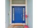 Inviting blue front door entrance with nautical decor at 6843 Boulder Run Loop, Wesley Chapel, FL 33545