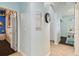 Bright hallway with access to other rooms at 6843 Boulder Run Loop, Wesley Chapel, FL 33545