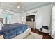 Bright and airy main bedroom with a king-size bed and calming decor at 6843 Boulder Run Loop, Wesley Chapel, FL 33545