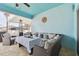 Covered patio with seating and heater at 6843 Boulder Run Loop, Wesley Chapel, FL 33545