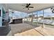Relaxing screened patio with tiled floor and hot tub at 6843 Boulder Run Loop, Wesley Chapel, FL 33545