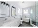 Elegant bathroom with double vanity, soaking tub, and separate shower at 8119 N Dakota, Tampa, FL 33604