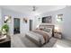 Main bedroom with a king-size bed and ensuite bathroom access at 8119 N Dakota, Tampa, FL 33604