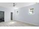 Main bedroom with ensuite bathroom and ceiling fan at 8119 N Dakota, Tampa, FL 33604