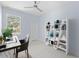 Home office features built-in shelving, a desk, and large window at 8119 N Dakota, Tampa, FL 33604