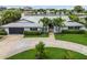 Stunning waterfront home with a large yard at 221 Howard Dr, Belleair Beach, FL 33786