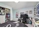 Stylish bedroom with gaming setup and ample closet space at 221 Howard Dr, Belleair Beach, FL 33786