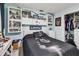 Youth bedroom with Lightning-themed bedding and ample storage at 221 Howard Dr, Belleair Beach, FL 33786