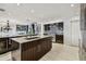 Spacious kitchen featuring stainless steel appliances and a large island at 221 Howard Dr, Belleair Beach, FL 33786