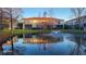 Townhouse with pond and fountain view, reflection visible at 277 Valencia Cir, St Petersburg, FL 33716