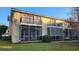 Townhouse back view, screened porch and balcony at 277 Valencia Cir, St Petersburg, FL 33716