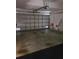 Spacious garage with a roll-up door, great for vehicle storage at 277 Valencia Cir, St Petersburg, FL 33716