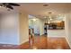 Open living area, hardwood floors, kitchen and stairs visible at 277 Valencia Cir, St Petersburg, FL 33716