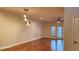 Bright living room with hardwood floors and modern light fixtures at 277 Valencia Cir, St Petersburg, FL 33716