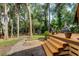 Wooden deck with stairs and walkway leading to backyard at 17210 Orangewood Dr, Lutz, FL 33548