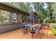 Spacious deck with outdoor furniture and tranquil lake views at 17210 Orangewood Dr, Lutz, FL 33548